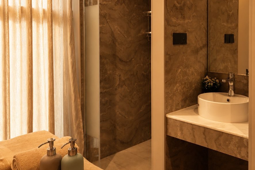 Private treatment room with wash basin and towel tray at Health Home Foot Spa, Jeddah
